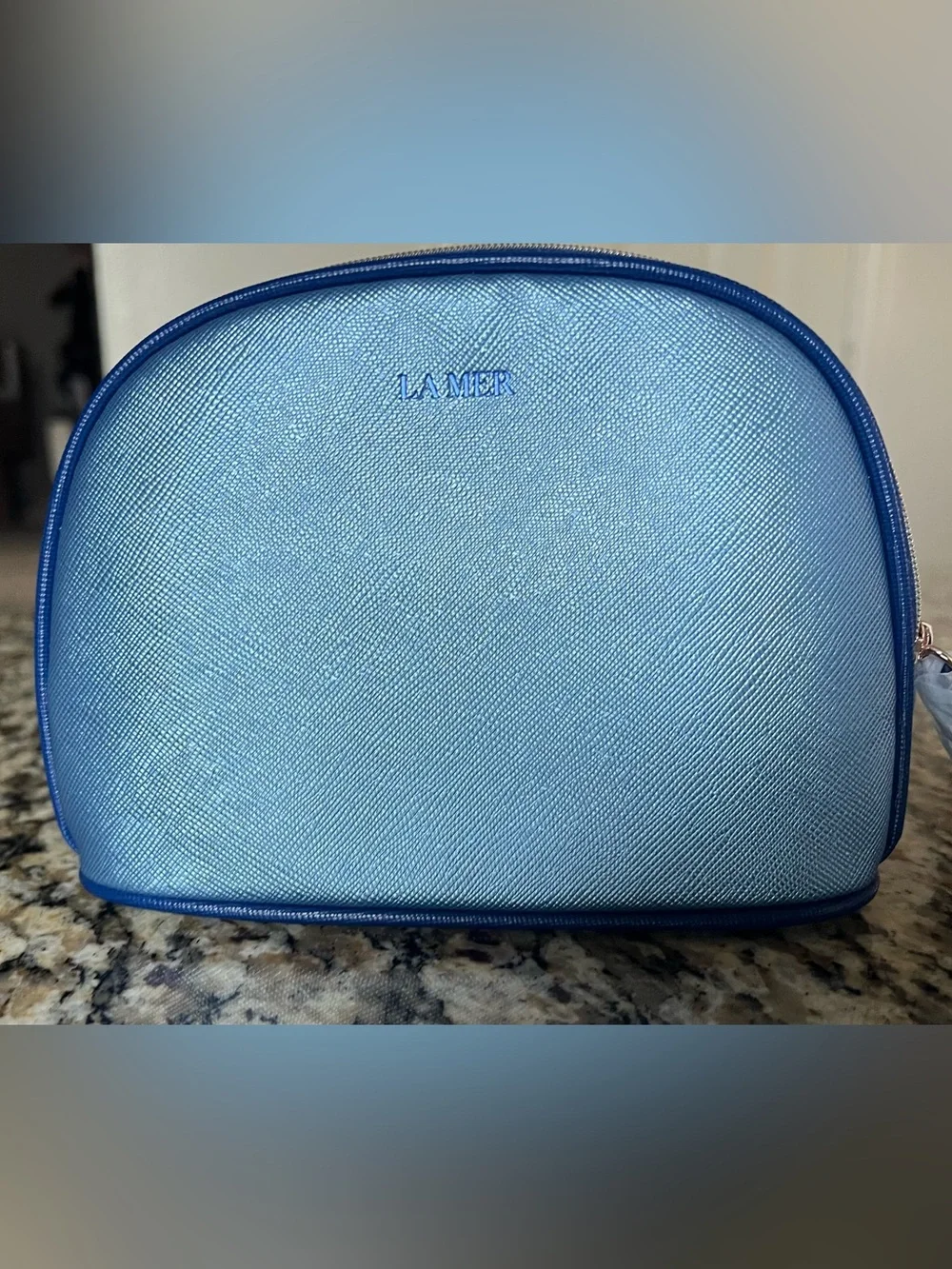 La Mer Metallic Blue Saffiano Faux Leather Cosmetic Bag